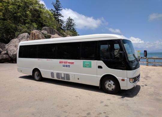 Bus parked on waterfront.